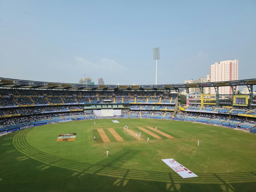 Cricket stadium packed with spectators during a match
