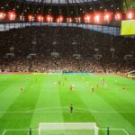 Packed soccer stadium during a league match