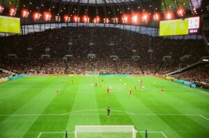 Packed soccer stadium during a league match