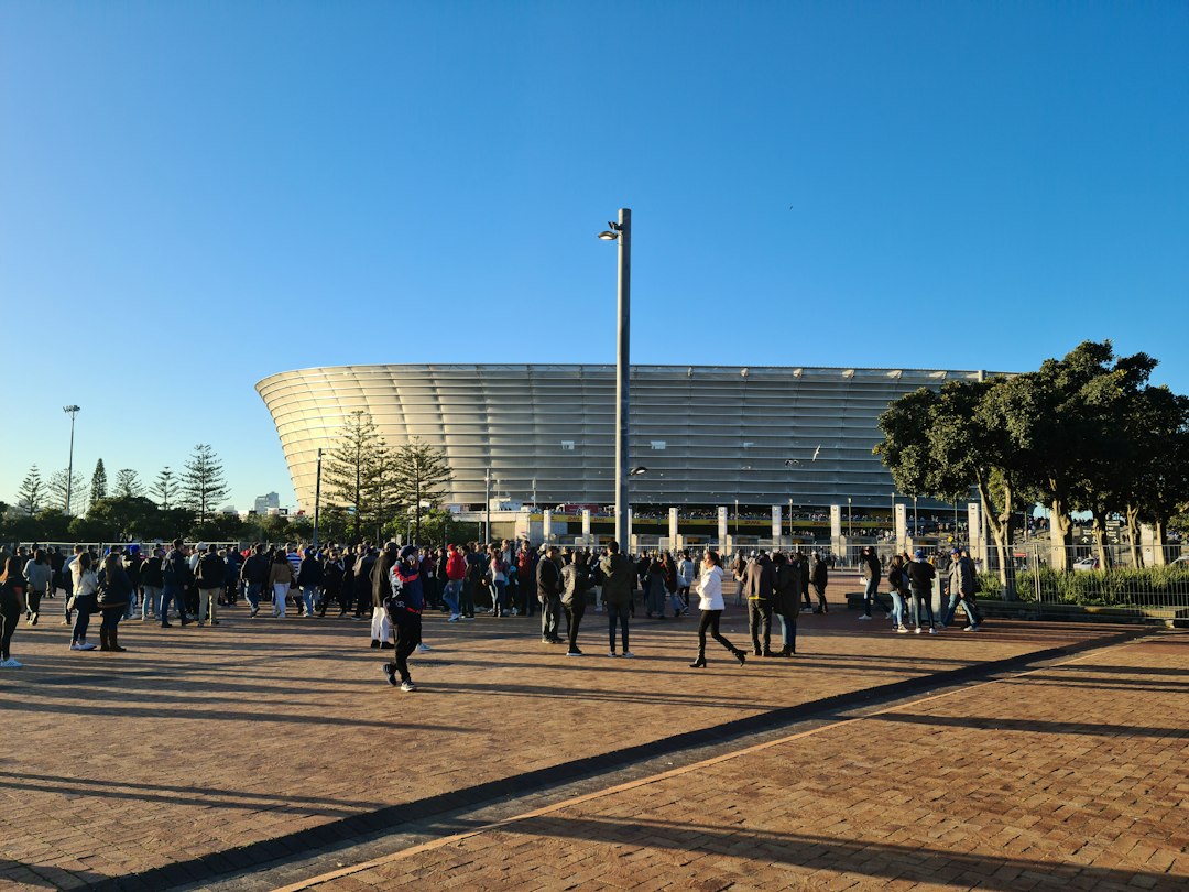 Crowd of fans at an African football stadium