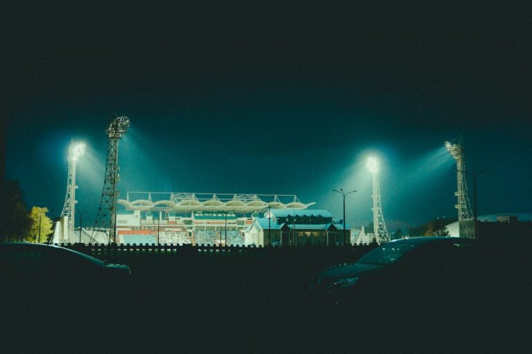 Stock photograph of stadium floodlights above a pitch on an evening kick-off. It is not a photograph of Durban City, AmaZulu, Chatsworth Stadium or any Betway Premiership match.